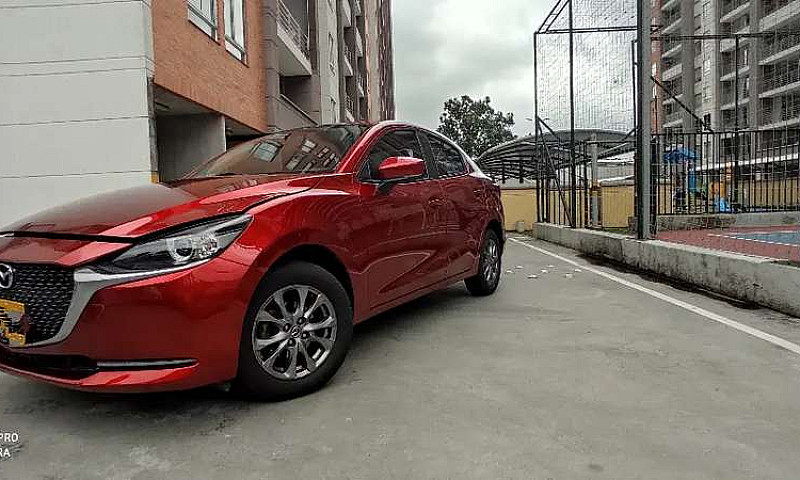 Mazda 2 Sedan Tourin...