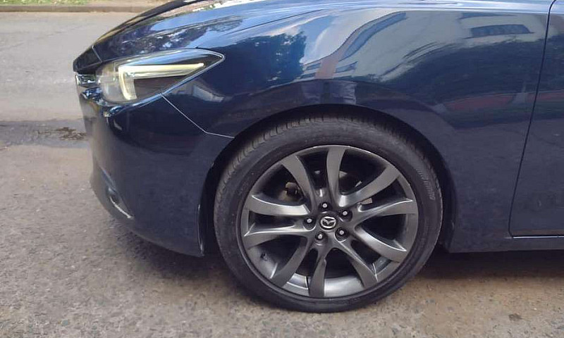 Mazda 3 Grand Tourin...