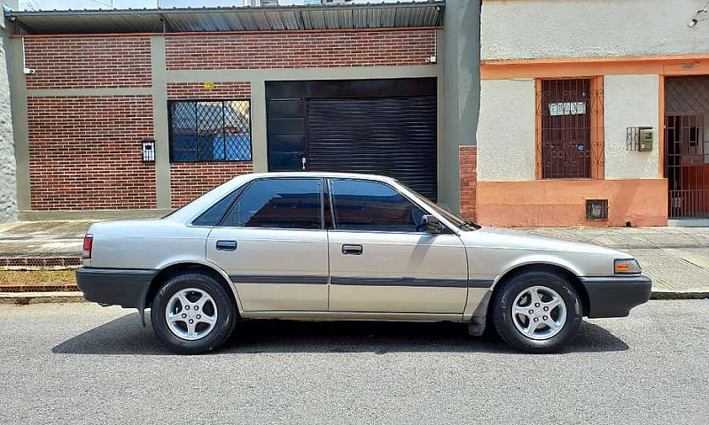 Vendo Impecable Mazd...