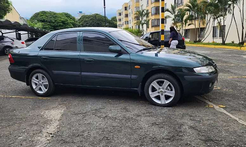 Vendo Mazda Milenio ...