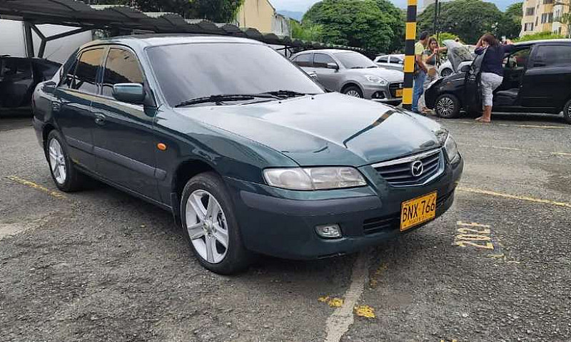 Vendo Mazda Milenio ...