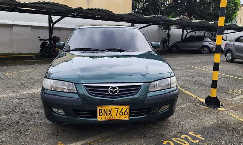 Vendo Mazda Milenio ...