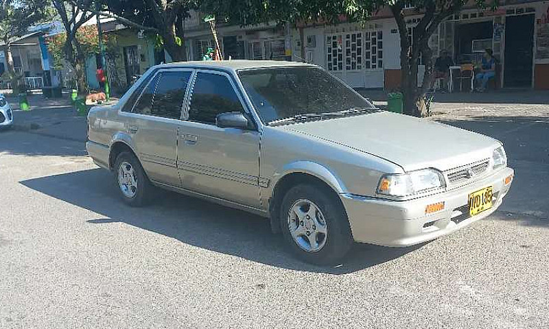 Mazda 323 Nxi A.a...