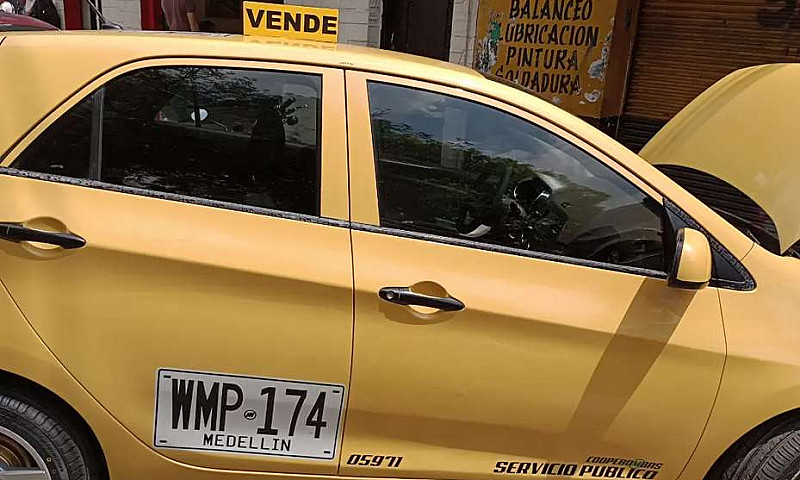 Taxi Kia Ion...