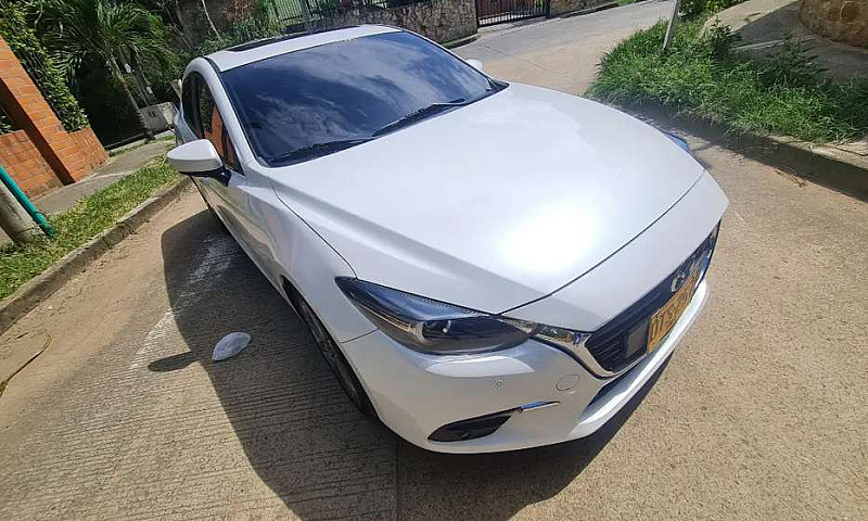 Mazda 3 Grand Tourin...