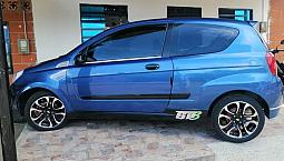 Vendo Hermoso Aveo Modelo 2011 Papeles Al Día Con Aire Alarma Bloqueo Cámara De Reversa Vidrios Eletricos