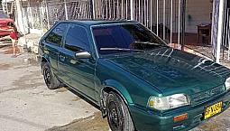 Hermoso Mazda 323